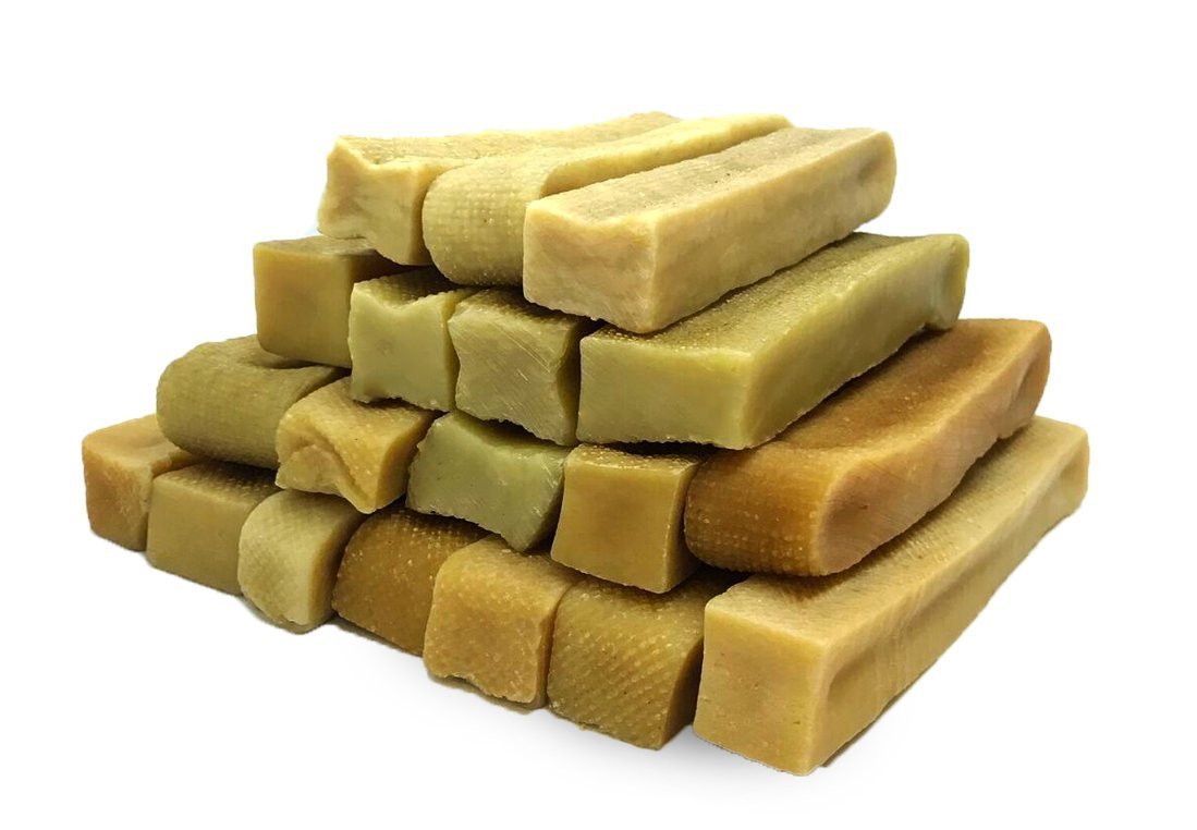 a large stack of EcoKind Himalayan Yak Chew Treats - Long Lasting, Grain-Free Chews for Dogs and Puppies