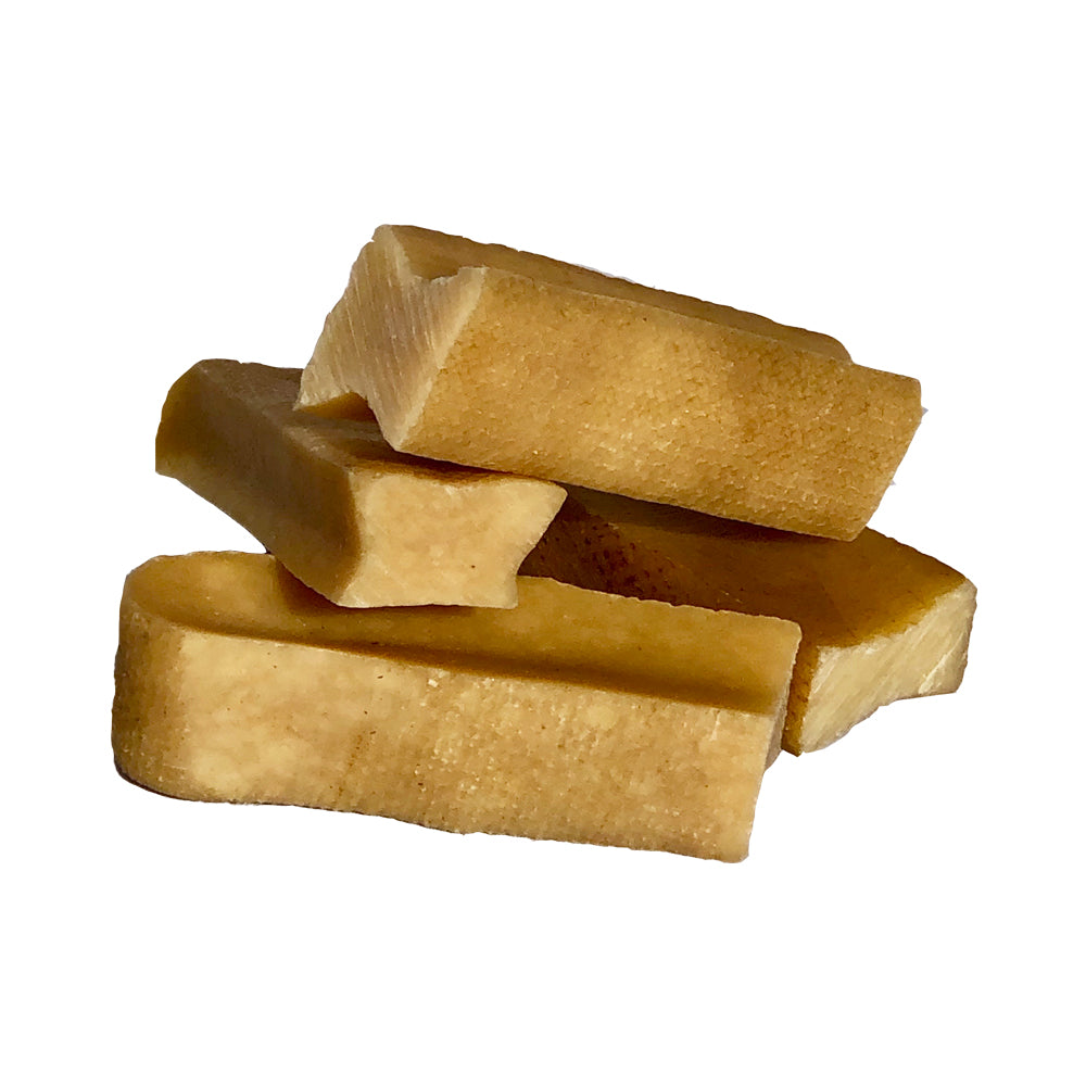 a stack of Small EcoKind Himalayan Yak Chew Treats - Long Lasting, Grain-Free Chews for Dogs and Puppies